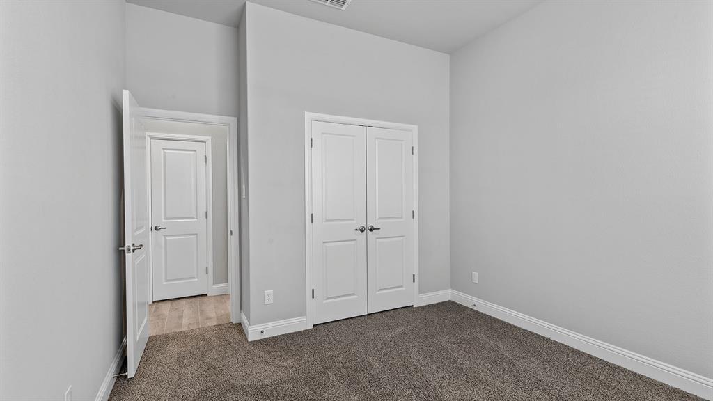729 Soaring Hawk Drive Aledo, TX 76008 - Photo 18 of 38 a view of an empty room