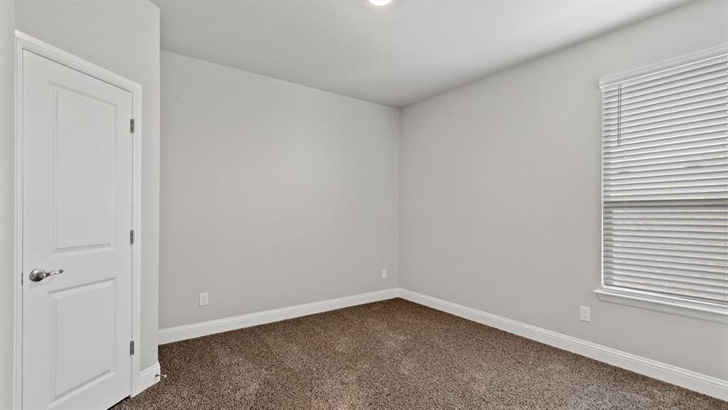 729 Soaring Hawk Drive Aledo, TX 76008 - Photo 26 of 38 a view of an empty room