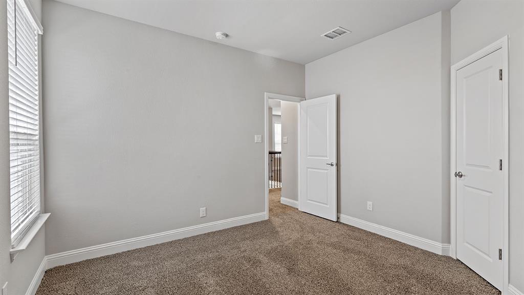 729 Soaring Hawk Drive Aledo, TX 76008 - Photo 27 of 38 a view of an empty room