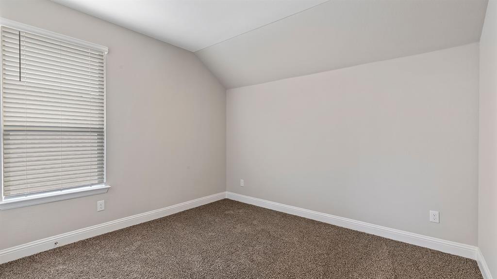 729 Soaring Hawk Drive Aledo, TX 76008 - Photo 29 of 38 an empty room with a window