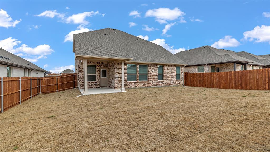 729 Soaring Hawk Drive Aledo, TX 76008 - Photo 34 of 38 a view of a house with wooden fence