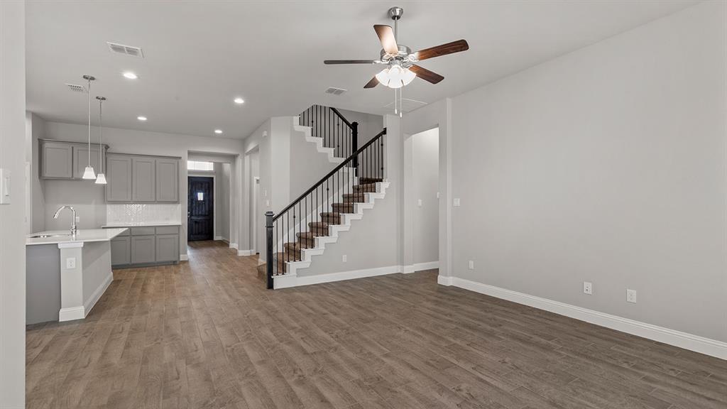 729 Soaring Hawk Drive Aledo, TX 76008 - Photo 8 of 38 a view of entryway and hall with wooden floor