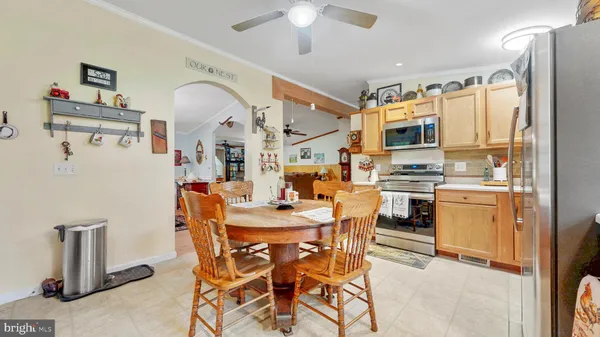 a kitchen with cabinets a sink and appliances