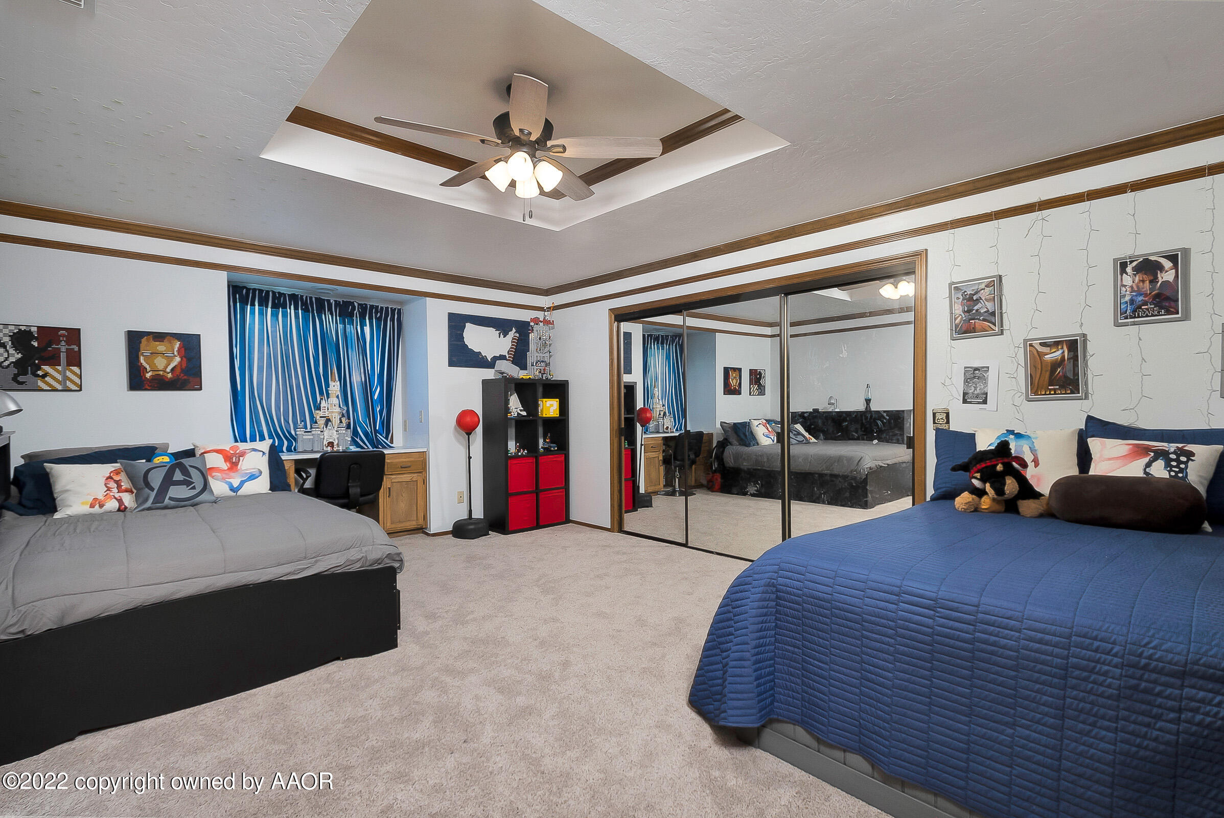 6600 Stoneham Drive Amarillo, TX 79109 - Photo 23 of 43 a living room with furniture and a chandelier