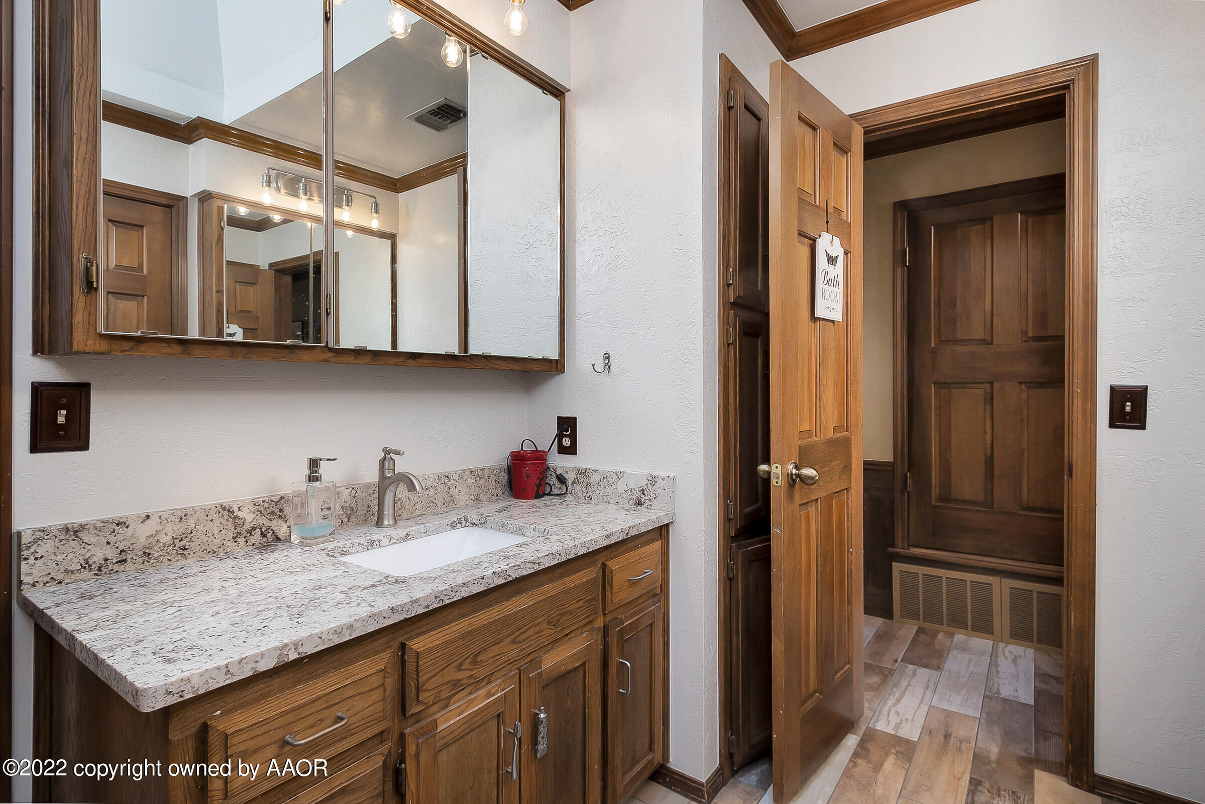 6600 Stoneham Drive Amarillo, TX 79109 - Photo 28 of 43 a kitchen with stainless steel appliances granite countertop a sink and cabinets