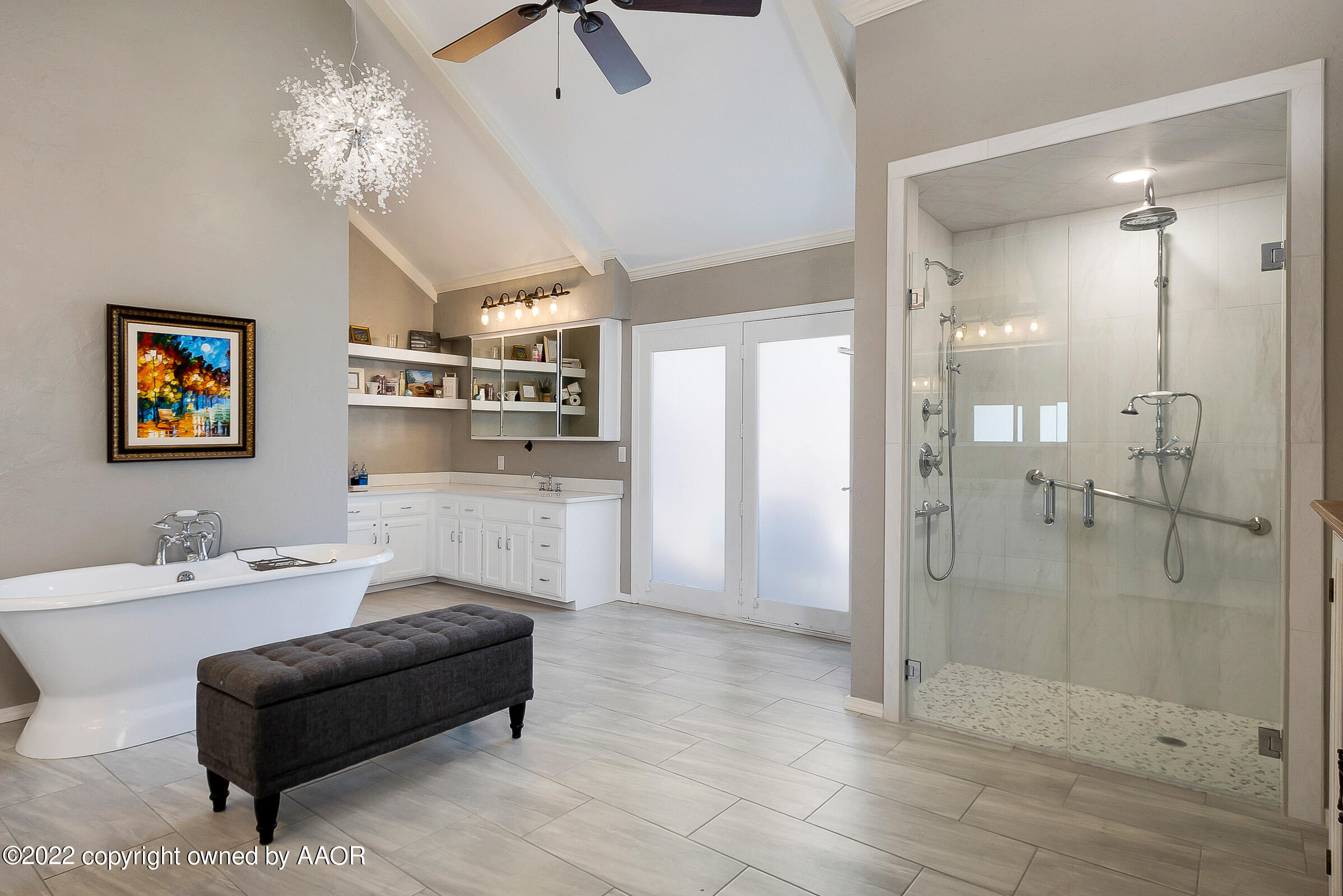6600 Stoneham Drive Amarillo, TX 79109 - Photo 3 of 43 a spacious bathroom with a double vanity sink shower and a mirror