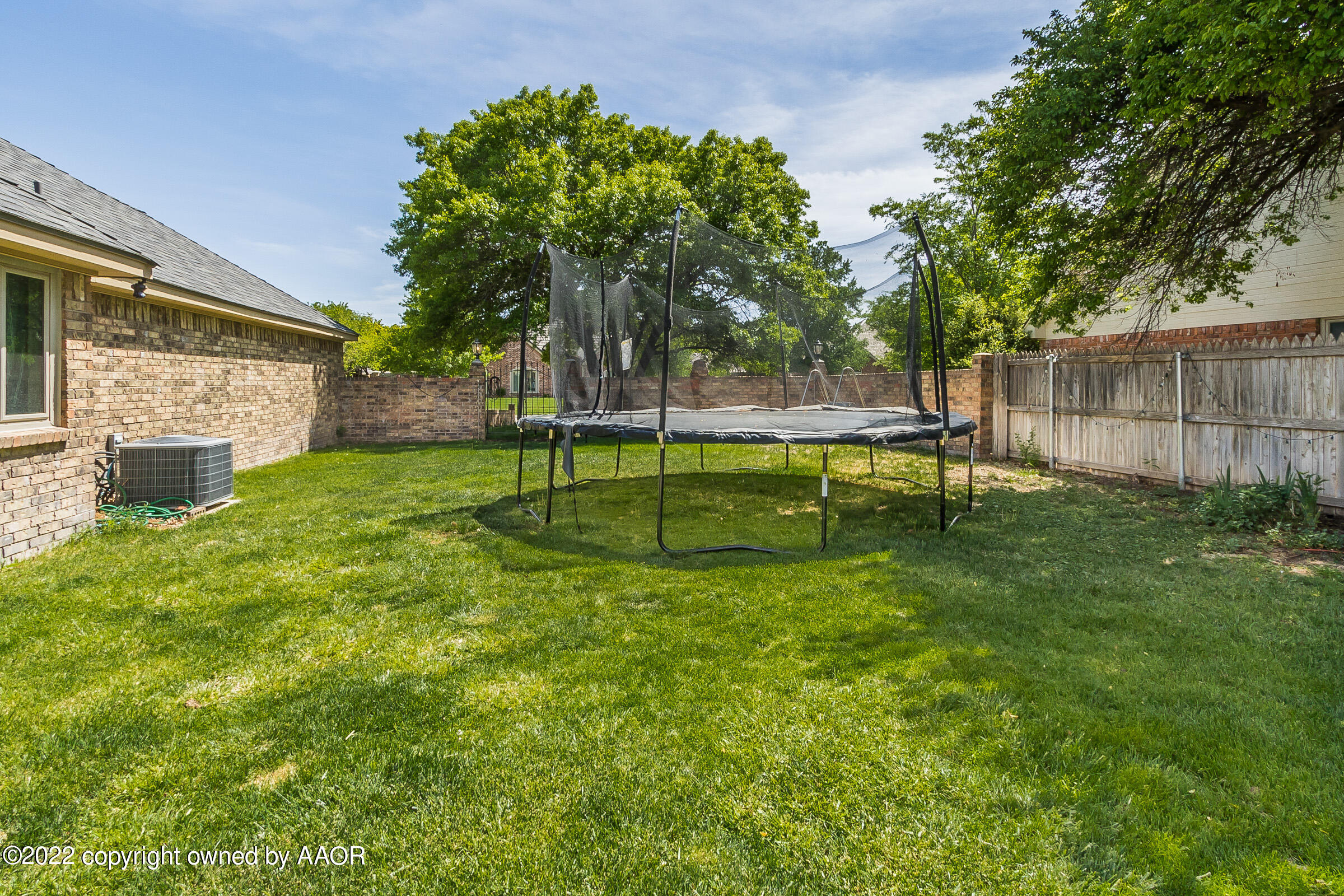 6600 Stoneham Drive Amarillo, TX 79109 - Photo 36 of 43 a view of a park with a slide