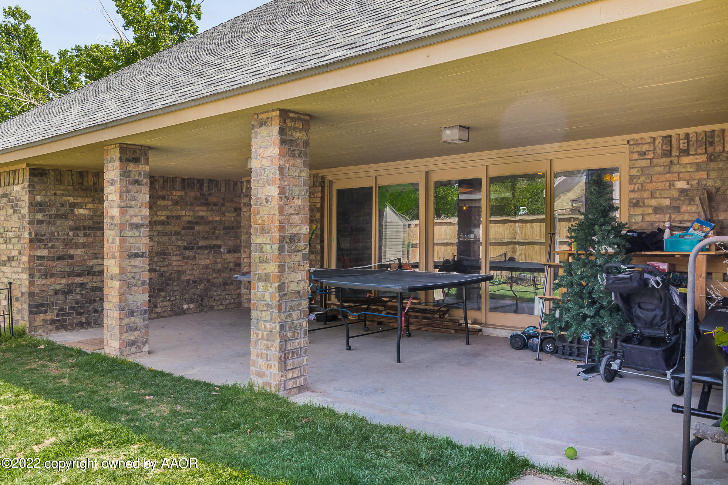 6600 Stoneham Drive Amarillo, TX 79109 - Photo 38 of 43 a view of a house with backyard porch and sitting area