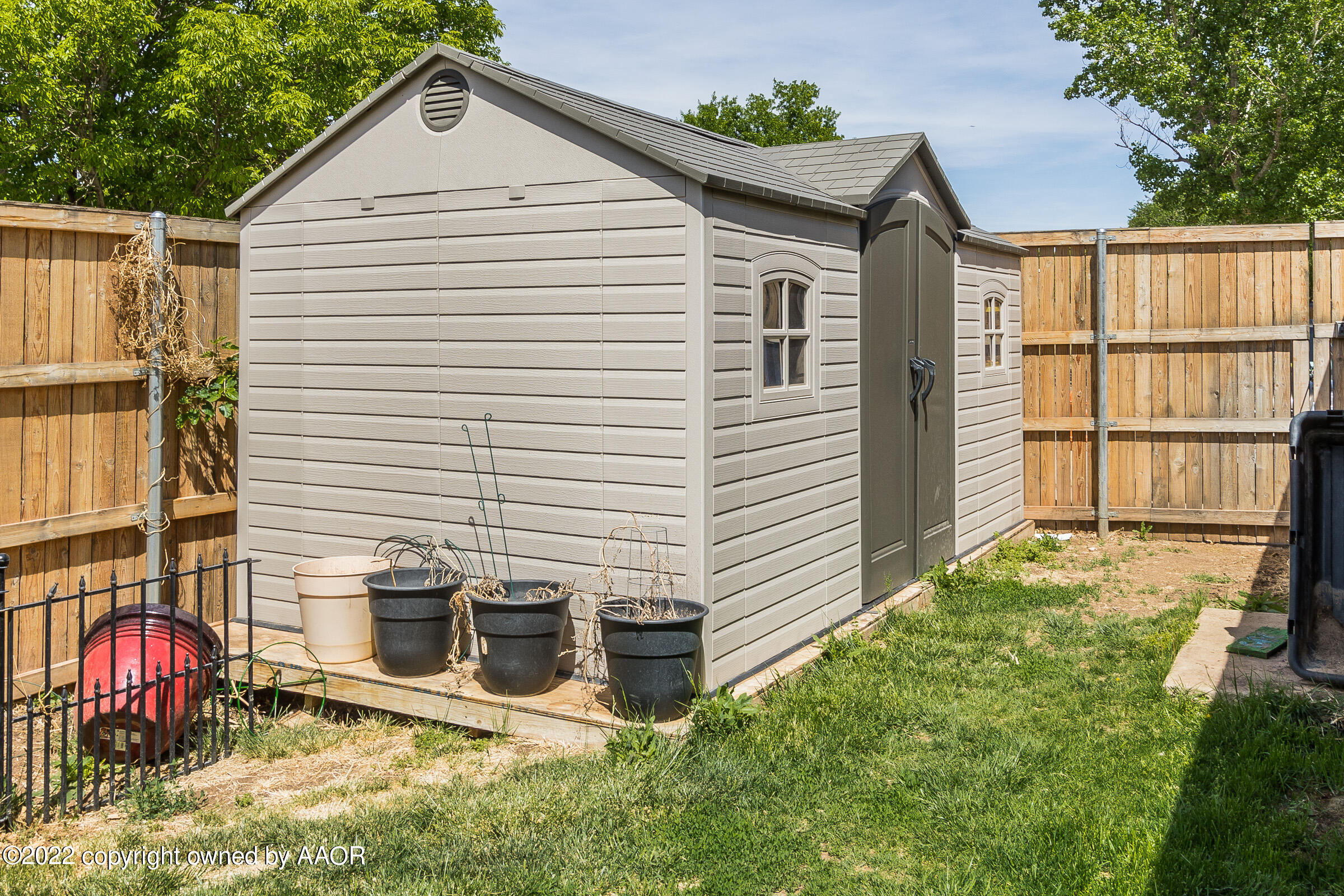 6600 Stoneham Drive Amarillo, TX 79109 - Photo 40 of 43 a view of a white house with many windows