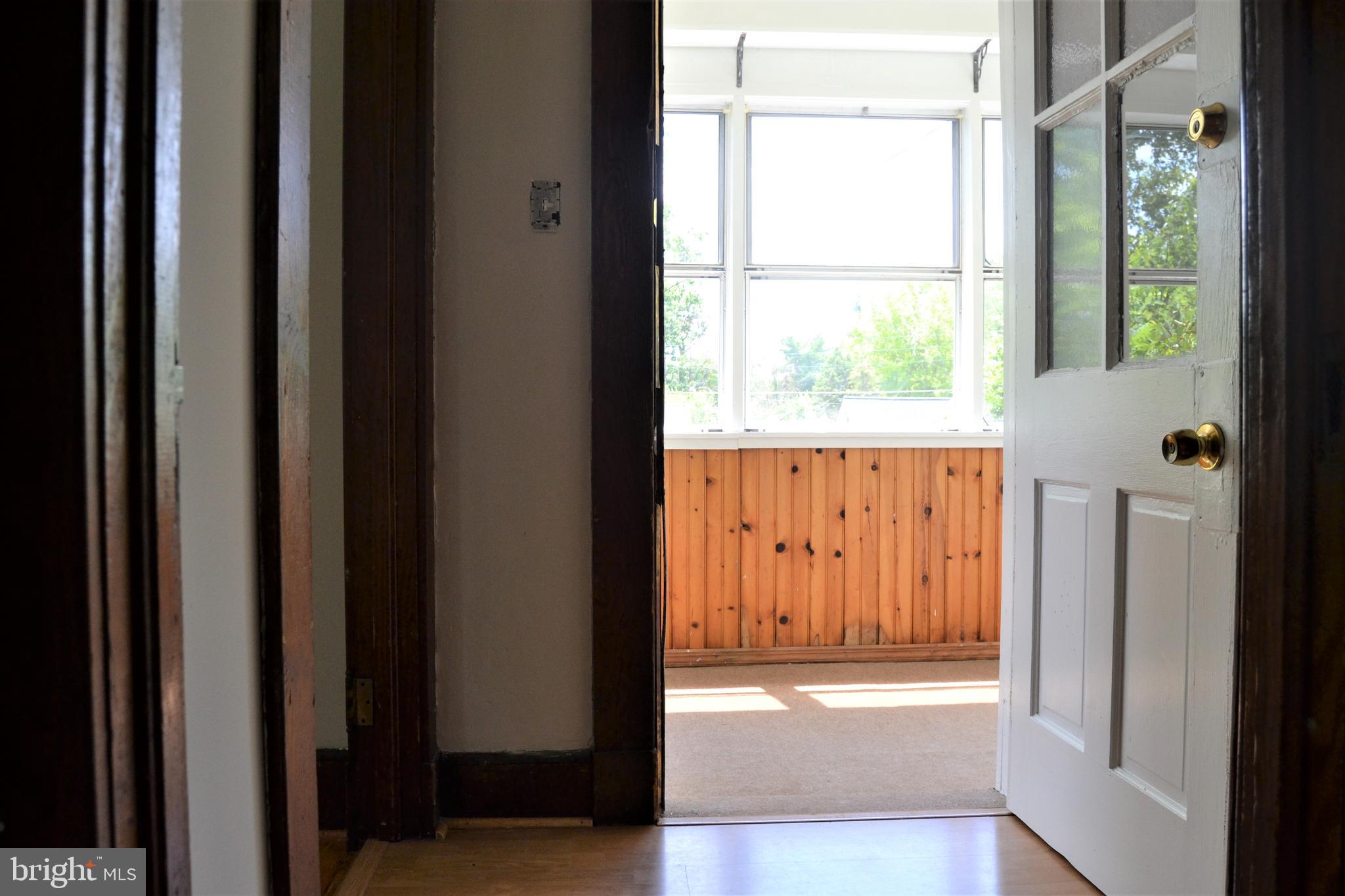 626 Orpington Road Baltimore, MD 21229 - Photo 14 of 40 Sun room off kitchen