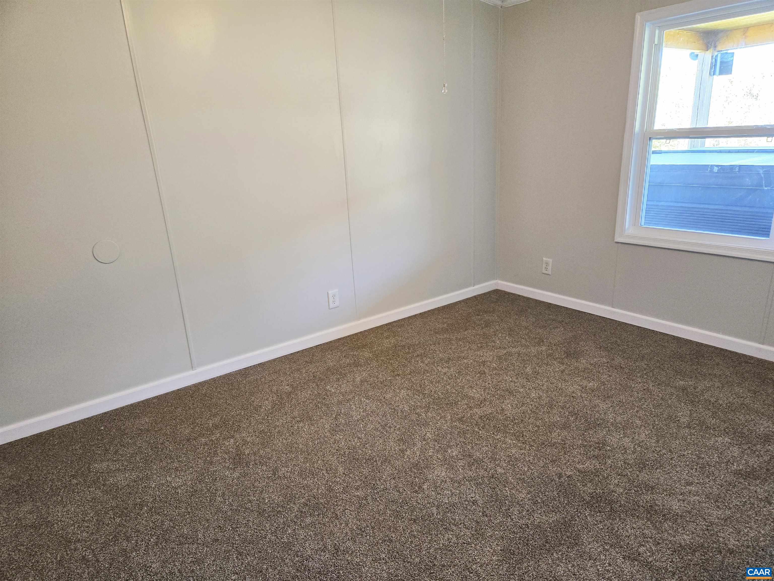 3691 Meherrin Road Meherrin, VA 23954 - Photo 20 of 75 an empty room with a window