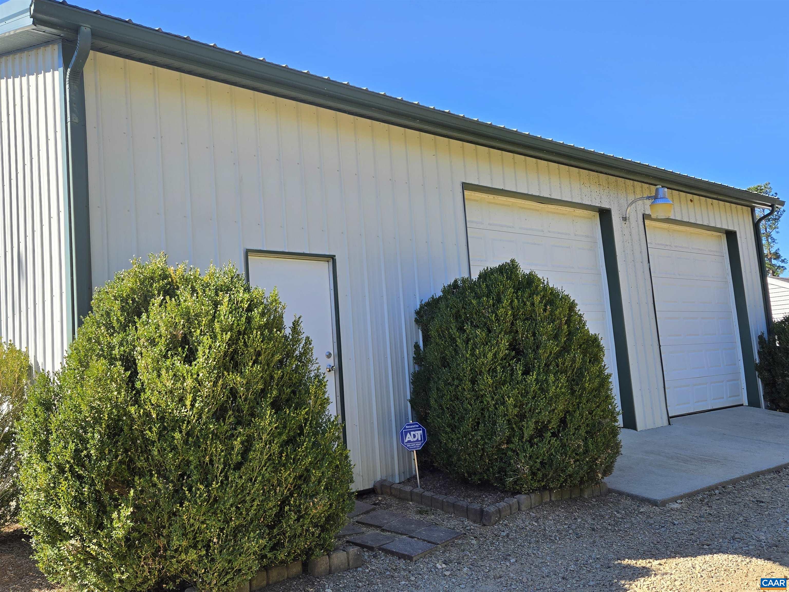 3691 Meherrin Road Meherrin, VA 23954 - Photo 36 of 75 a front view of a house with garden
