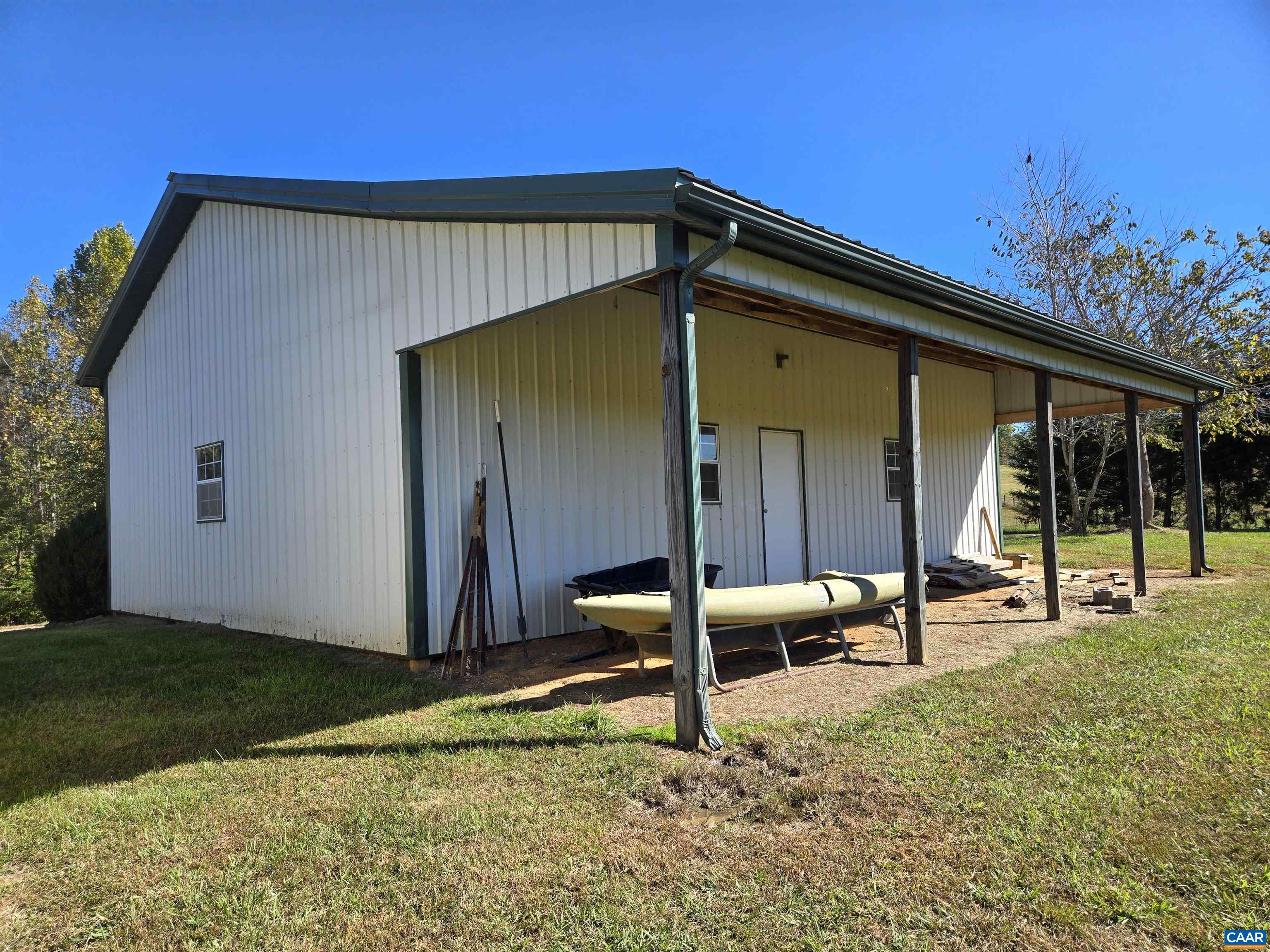 3691 Meherrin Road Meherrin, VA 23954 - Photo 40 of 75 a backyard of a house with table and chairs