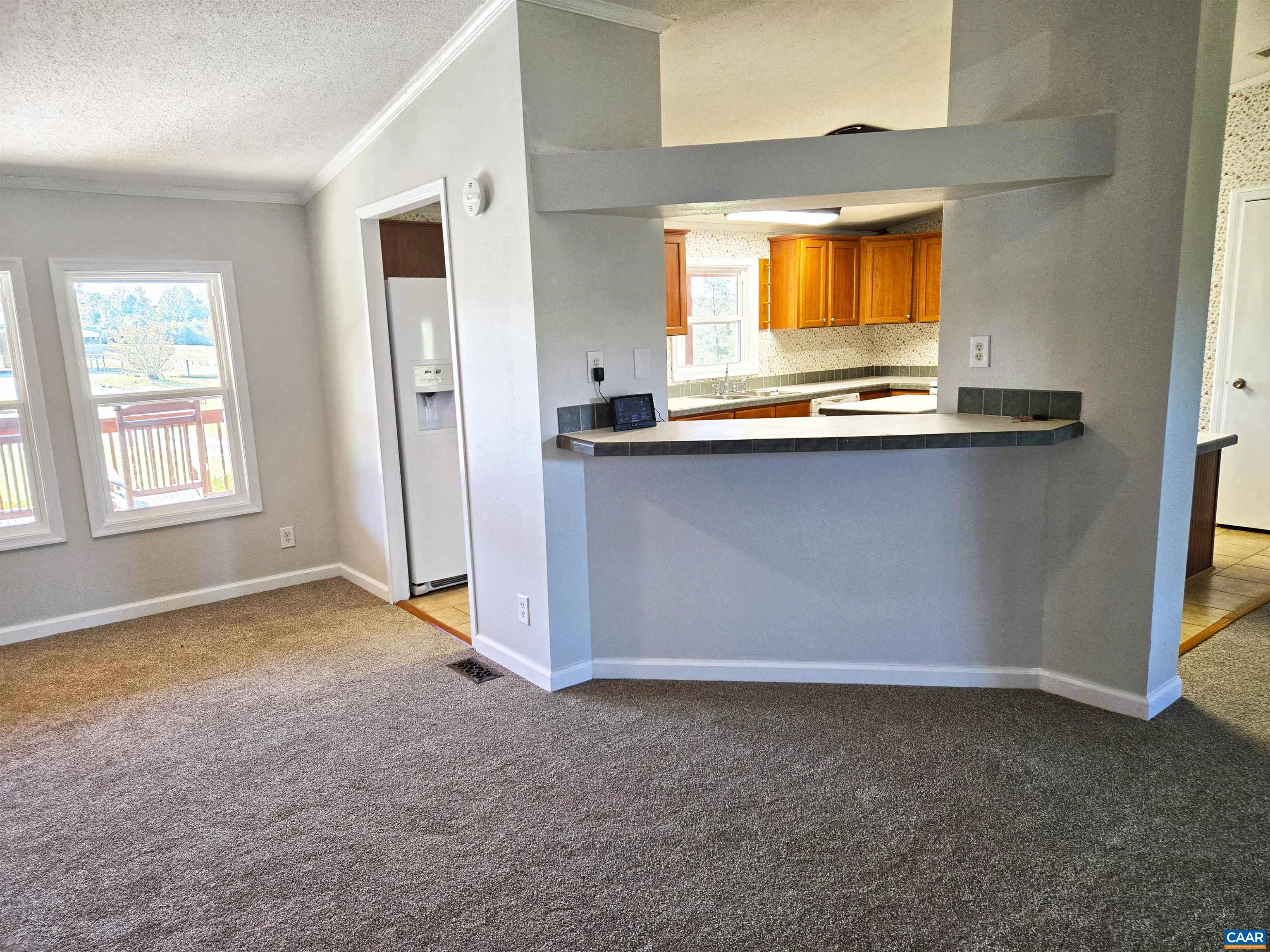 3691 Meherrin Road Meherrin, VA 23954 - Photo 9 of 75 an empty room with a window
