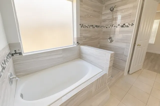 a bathroom with a bathtub