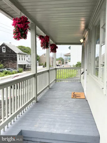a view of a swimming pool with a lounge chair
