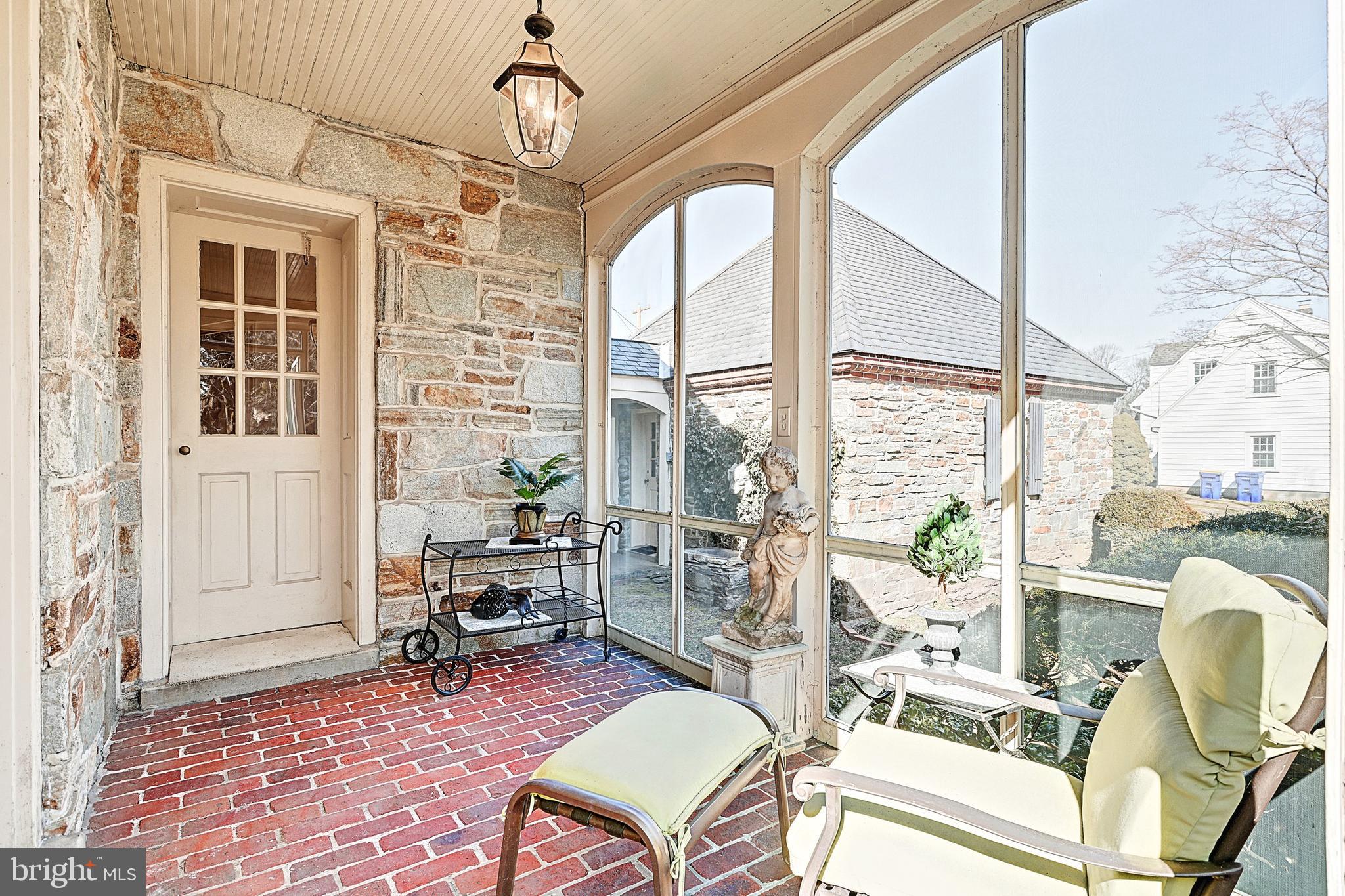 115 Singer Road New Freedom, PA 17349 - Photo 12 of 40 Lovely screened porch with arched frames.