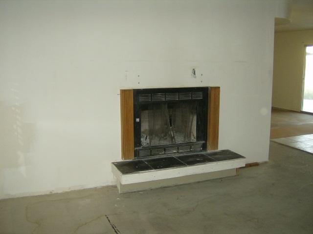 3444 West Calavar Road Phoenix, AZ 85053 - Photo 4 of 6 fireplace