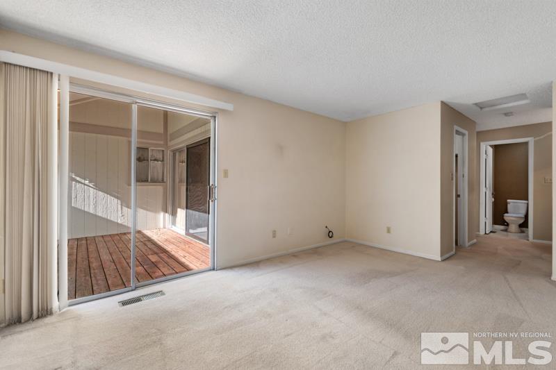 1236 Laredo Court Reno, NV 89503 - Photo 11 of 29 an empty room with windows