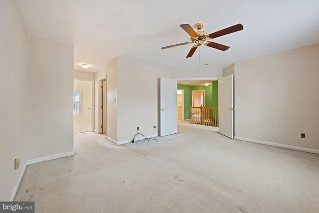 a view of an empty room and window
