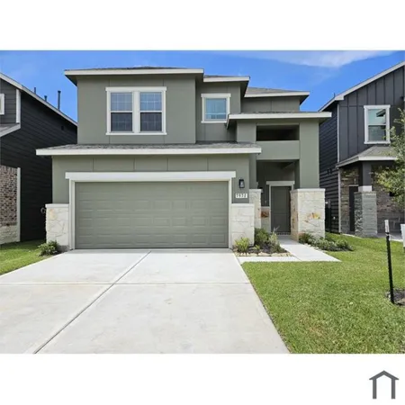 a black and white photo of a house
