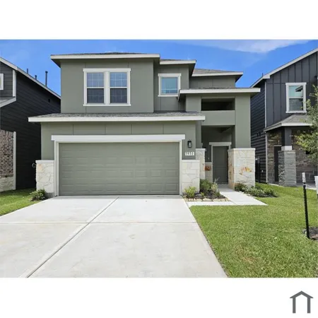 a black and white photo of a house