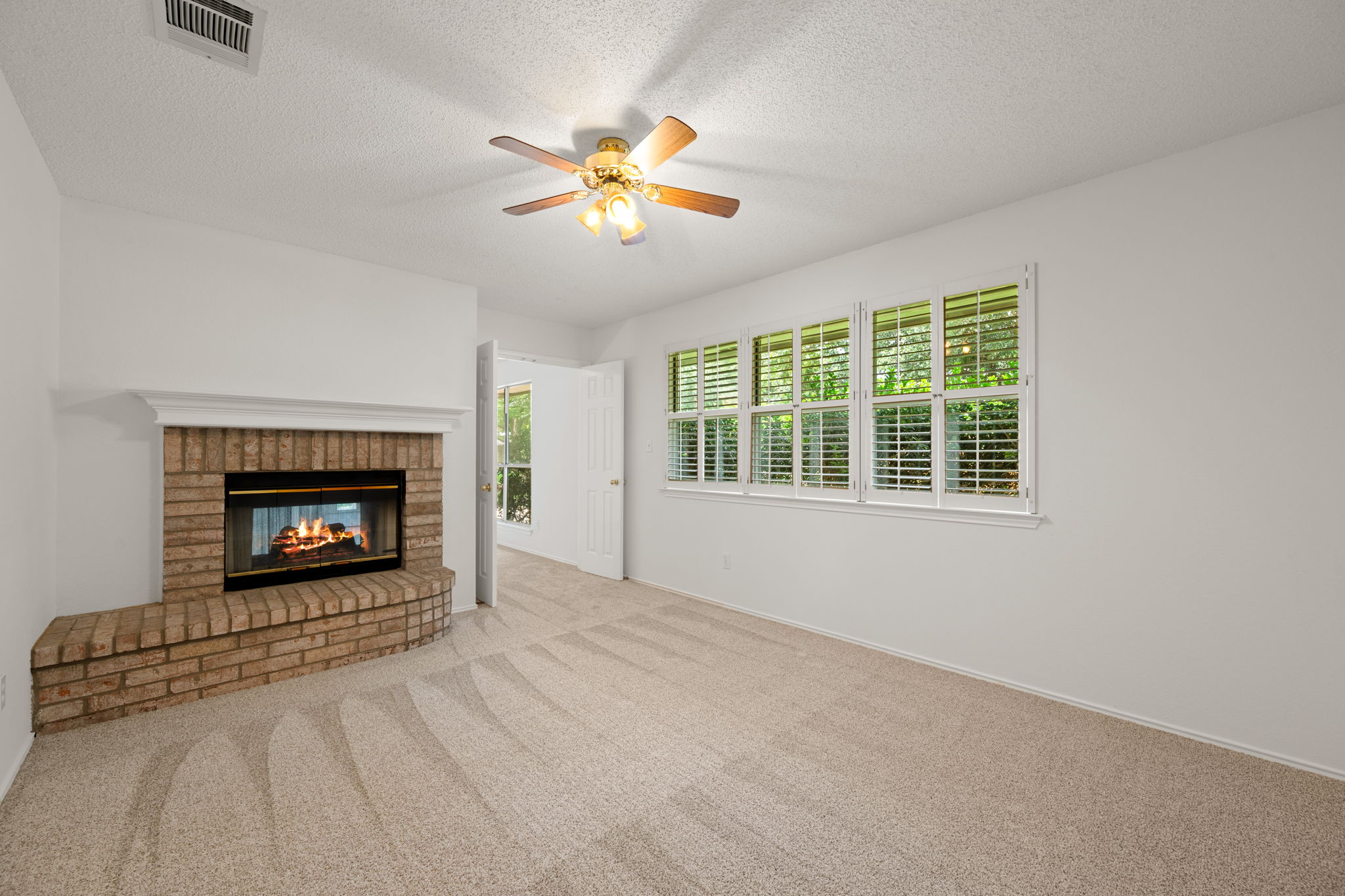 707 Ridge View Drive Leander, TX 78641 - Photo 35 of 40 a view of a livingroom with a fireplace and window