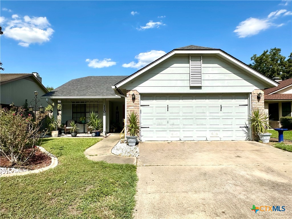 120 Andover Street Victoria, TX 77904 - Photo 2 of 40 a front view of a house with a yard and porch