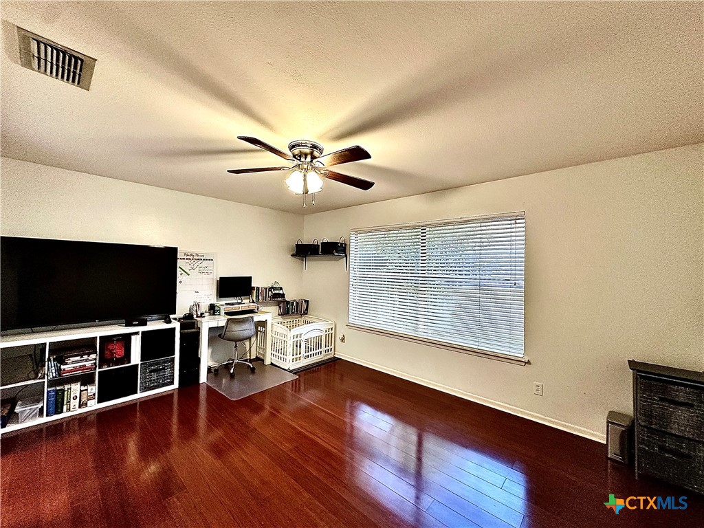 120 Andover Street Victoria, TX 77904 - Photo 28 of 40 a view of a livingroom with furniture and a flat screen tv