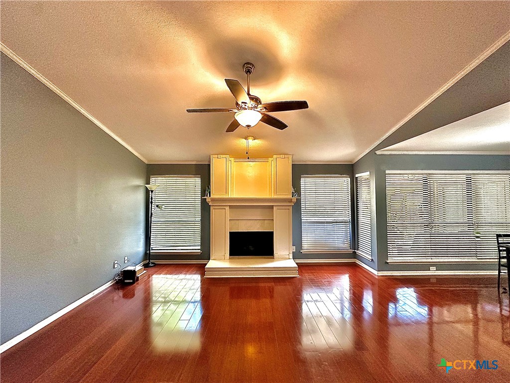 120 Andover Street Victoria, TX 77904 - Photo 5 of 40 a living room with fireplace furniture and a fireplace