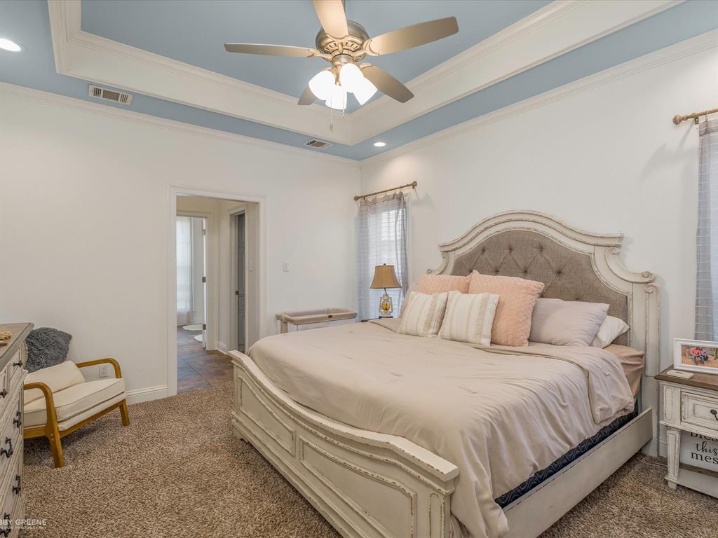 690 Lessie Drive Stonewall, LA 71078 - Photo 16 of 29 Tray ceiling with crown molding and recessed lighting