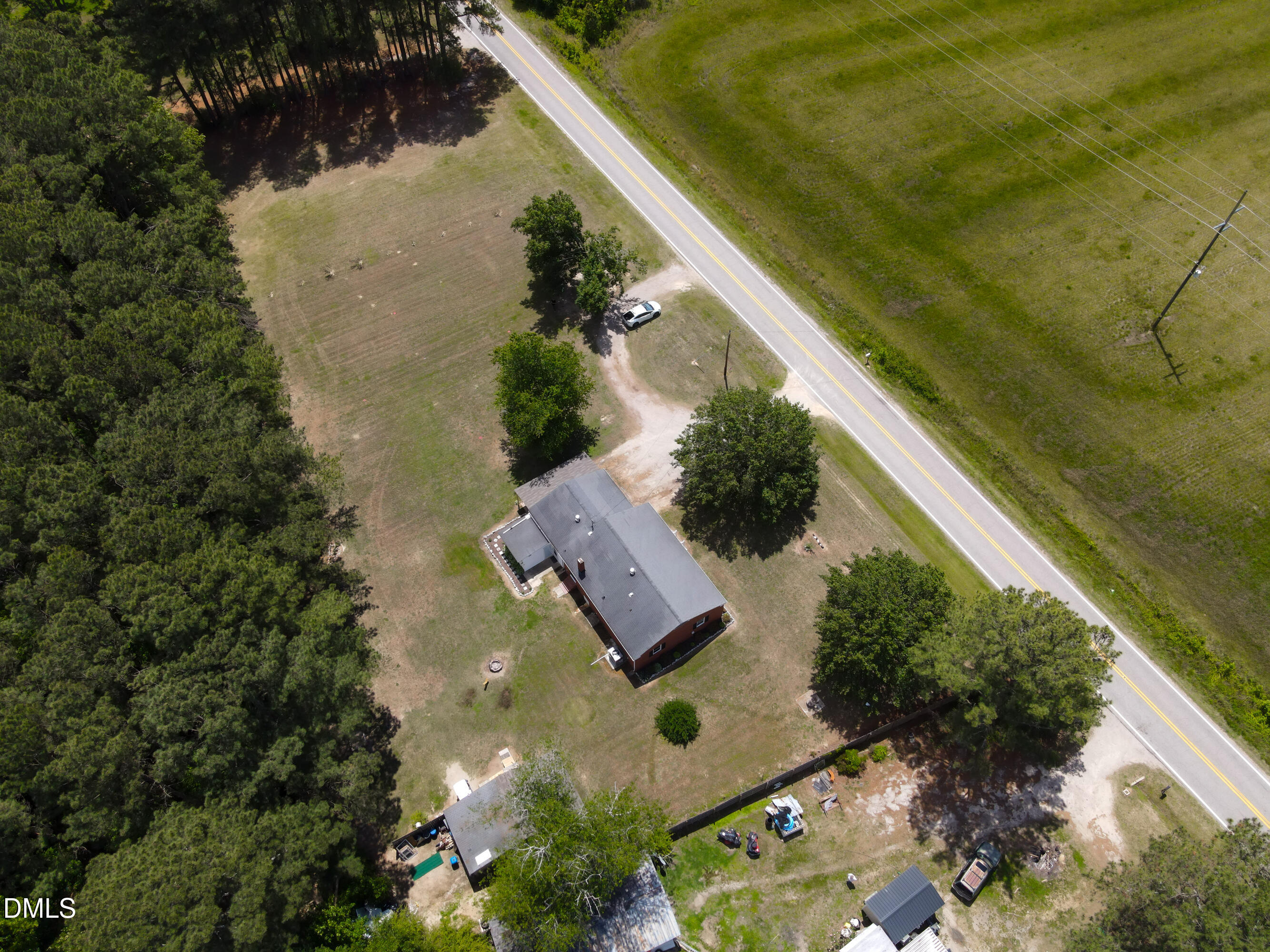 4967 Highway 581 Spring Hope, NC 27882 - Photo 43 of 44 an aerial view of house with yard and swimming pool