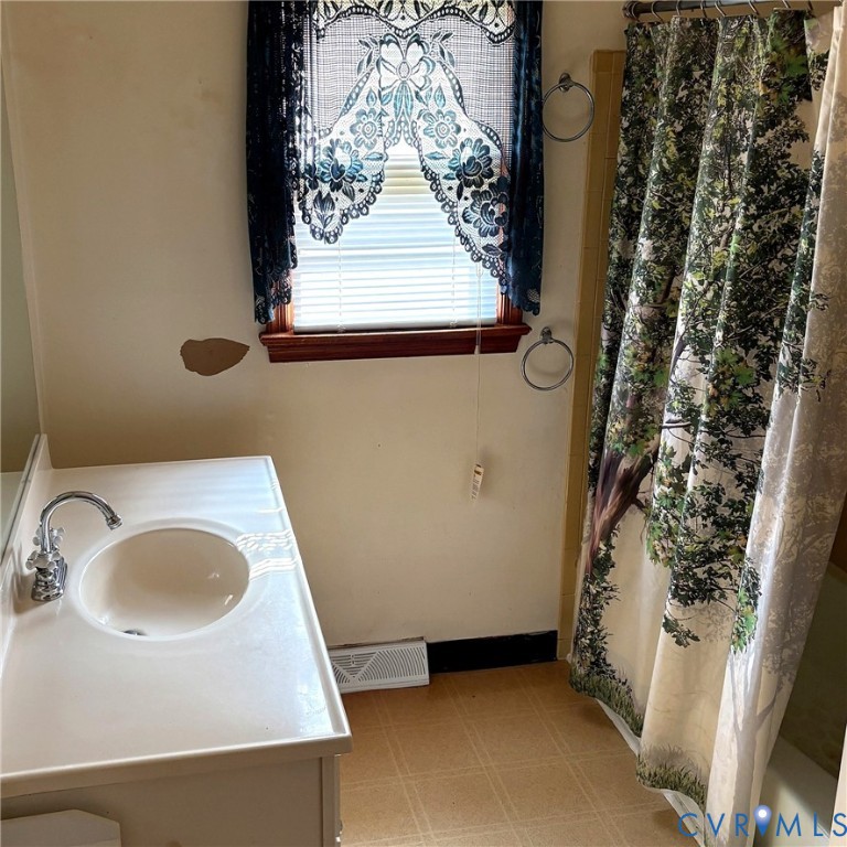 85 Frenchs Store Road Cumberland, VA 23040 - Photo 12 of 19 Bathroom featuring a white vanity with an integrat