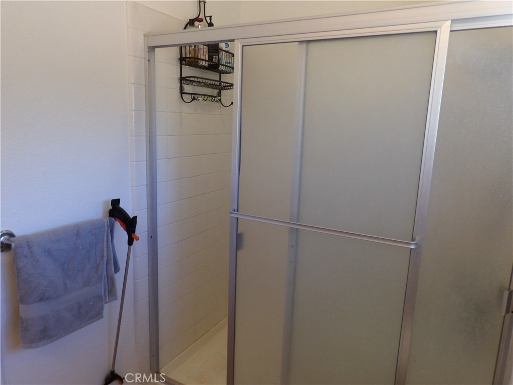 19140 Lahey Street, Unit 4 Porter Ranch, CA 91326 - Photo 12 of 37 a bathroom with a shower