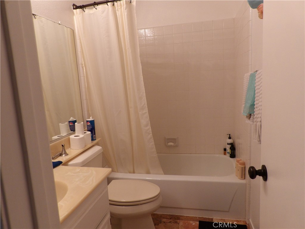 19140 Lahey Street, Unit 4 Porter Ranch, CA 91326 - Photo 16 of 37 a bathroom with a sink and a toilet