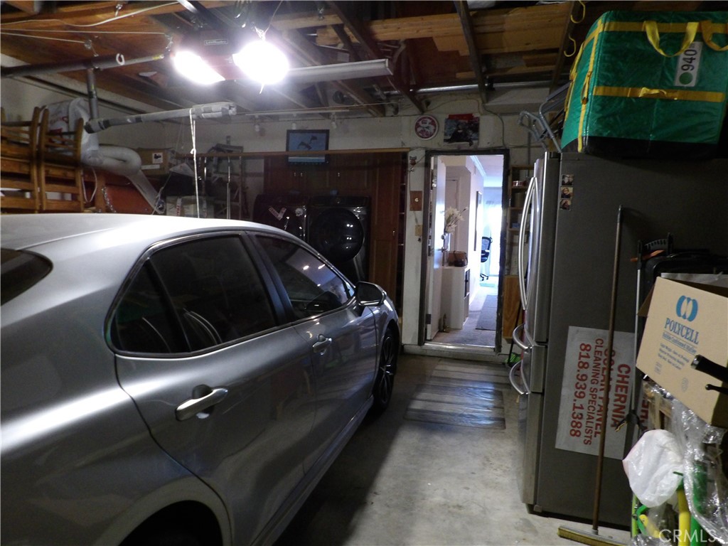 19140 Lahey Street, Unit 4 Porter Ranch, CA 91326 - Photo 17 of 37 a utility room with dryer and washer