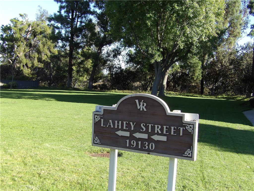 19140 Lahey Street, Unit 4 Porter Ranch, CA 91326 - Photo 26 of 37 a view of a park that has sign board