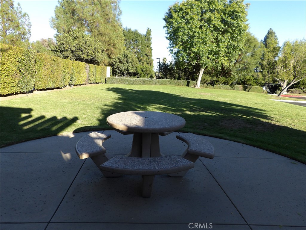 19140 Lahey Street, Unit 4 Porter Ranch, CA 91326 - Photo 29 of 37 a view of a patio with a yard