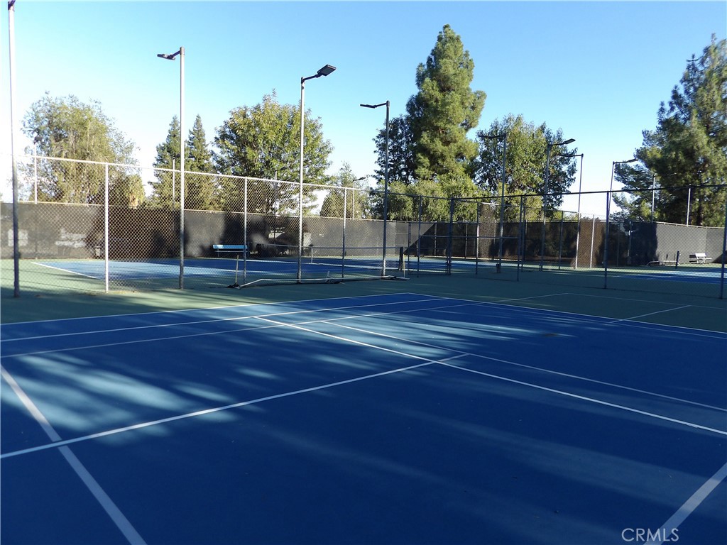 19140 Lahey Street, Unit 4 Porter Ranch, CA 91326 - Photo 31 of 37 a view of a tennis court