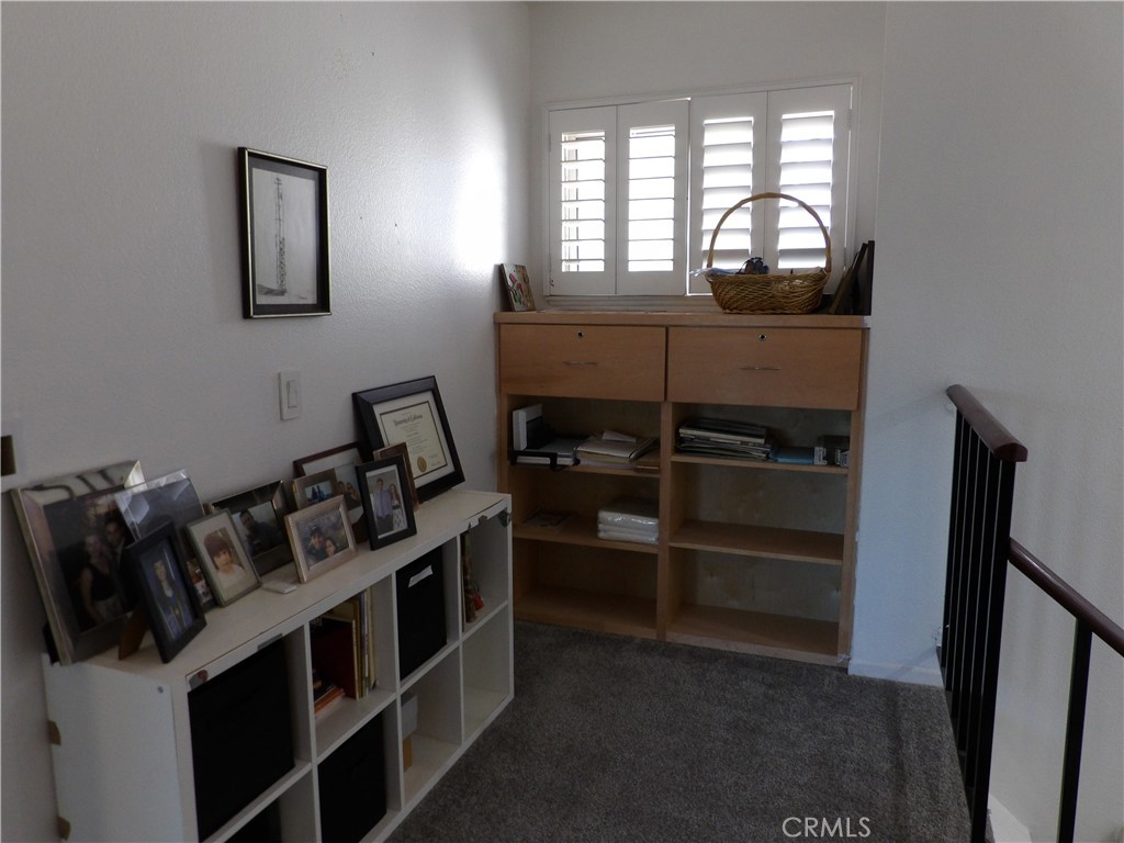 19140 Lahey Street, Unit 4 Porter Ranch, CA 91326 - Photo 9 of 37 a view of a livingroom with furniture and window