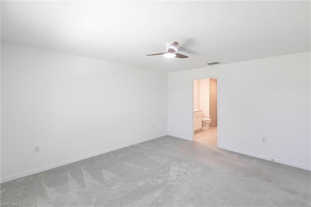 358 Pembroke Street Lehigh Acres, FL 33974 - Photo 25 of 45 a view of an empty room
