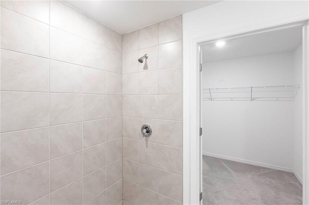 358 Pembroke Street Lehigh Acres, FL 33974 - Photo 27 of 45 a bathroom with a shower