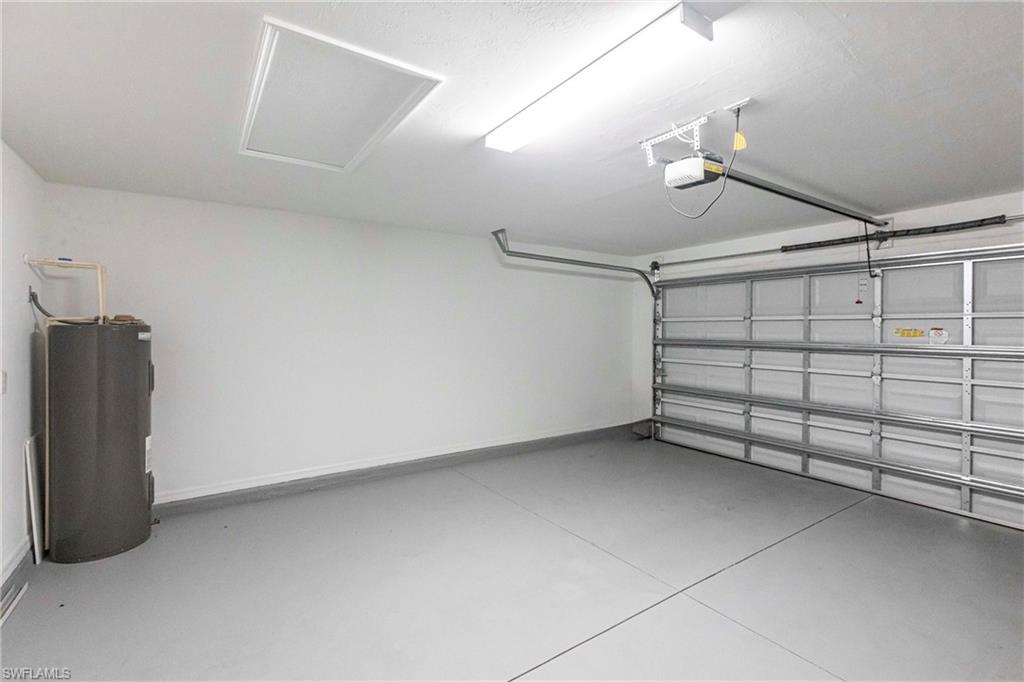 358 Pembroke Street Lehigh Acres, FL 33974 - Photo 32 of 45 a view of a garage