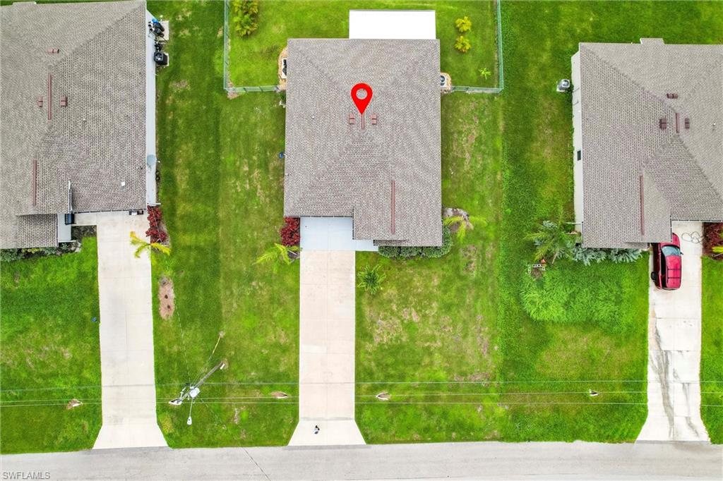 358 Pembroke Street Lehigh Acres, FL 33974 - Photo 41 of 45 an aerial view of a house