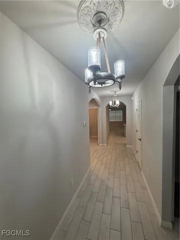 a very nice looking room with a chandelier