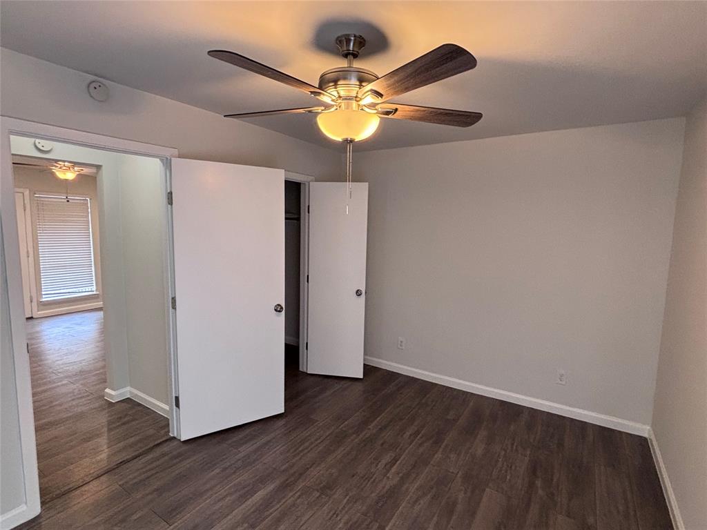 4300 Congress Avenue, Unit 216 Dallas, TX 75219 - Photo 9 of 13 a view of a livingroom with wooden floor