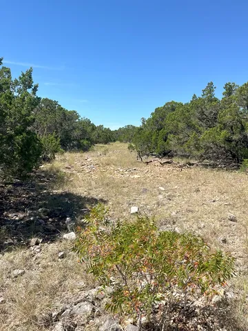 a view of a lake with mountain in the background