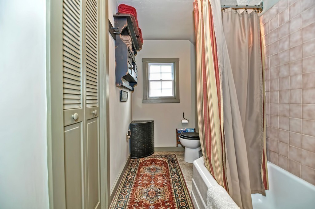 63 Wawela Park Road Webster, MA 01570 - Photo 27 of 30 a bathroom with a toilet and a shower