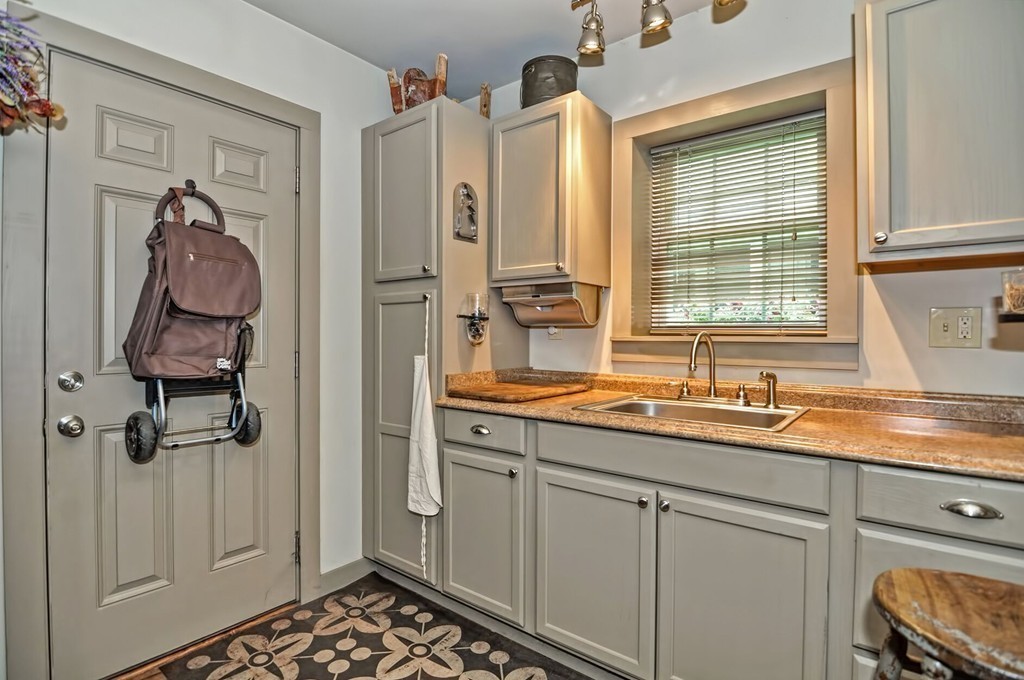 63 Wawela Park Road Webster, MA 01570 - Photo 28 of 30 a bathroom with a sink and a window