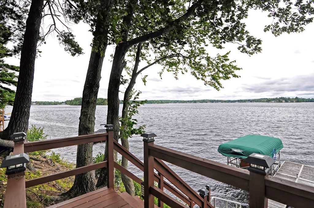 63 Wawela Park Road Webster, MA 01570 - Photo 5 of 30 a view of a lake from a balcony